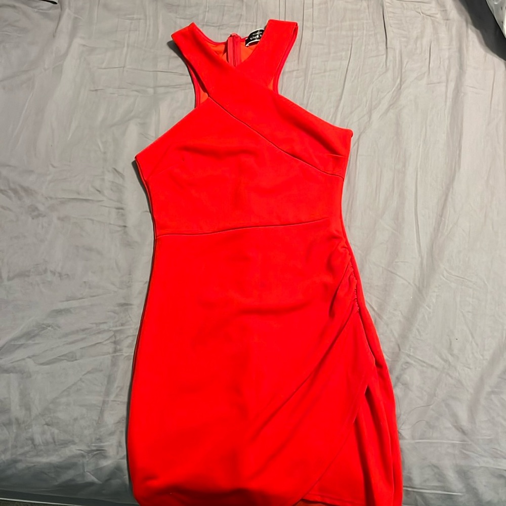 Blue blush criss cross red dress.